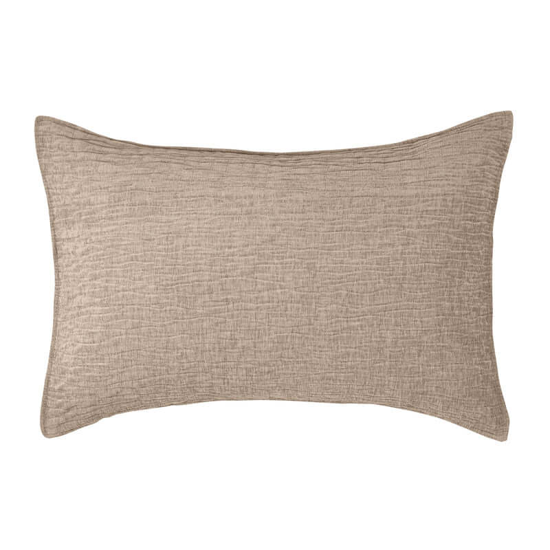 Pillow with a textured taupe finish, ideal for adding elegance to any bedding set.