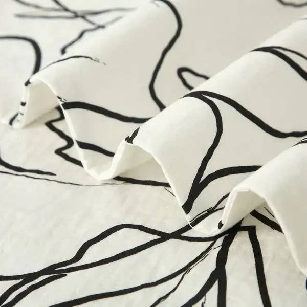 Ensemble de housse de couette NOAH Housse de couette  ,disponible chez Literie-Déco et moi 