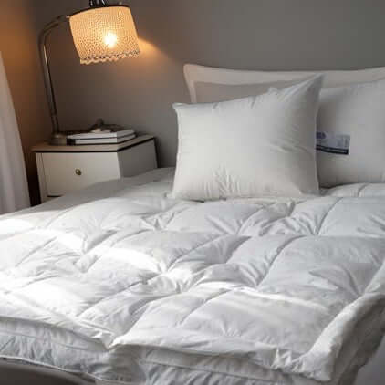 Surmatelas en plumes ( Collection Literie & Déco et moi ) surmatelas  ,disponible chez Literie-Déco et moi 