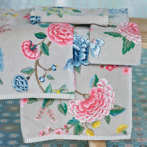 Serviette kaki avec fleurs colorées Good Evening - Par Brunelli serviettes  ,disponible chez Literie-Déco et moi 